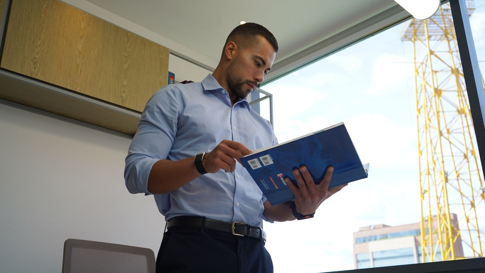 Dr. Juan Moncada reading